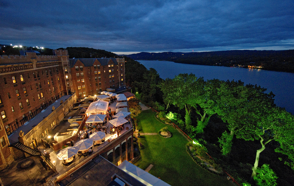 The outdoor lounge at the Thayer hotel, lit magnificently for a night time event